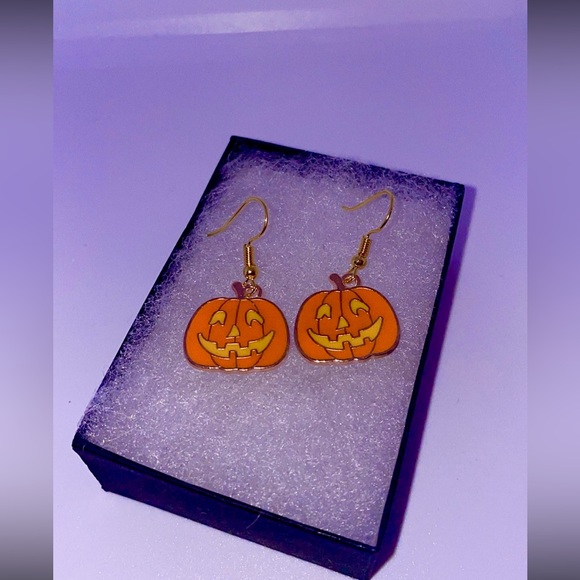 Urban Outfitters Jewelry - Gold pumpkin earrings in the color orange
